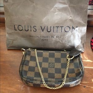 Authentic Louis Vuitton Clutch